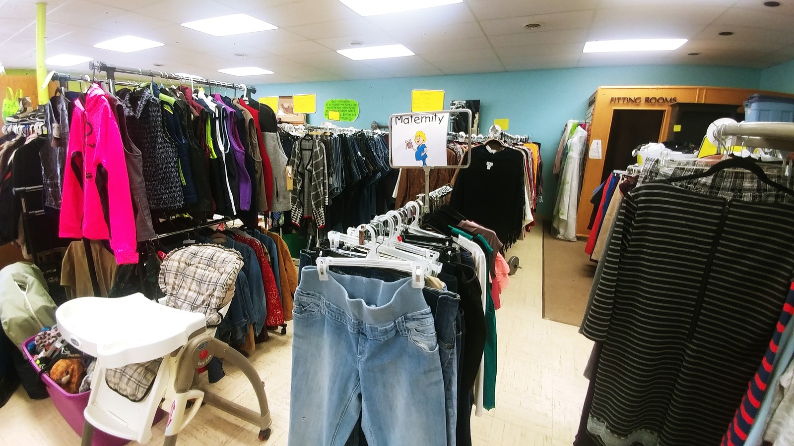 Clothing racks and colorful displays inside Second Chance Thrift in Ashby near Fergus Falls