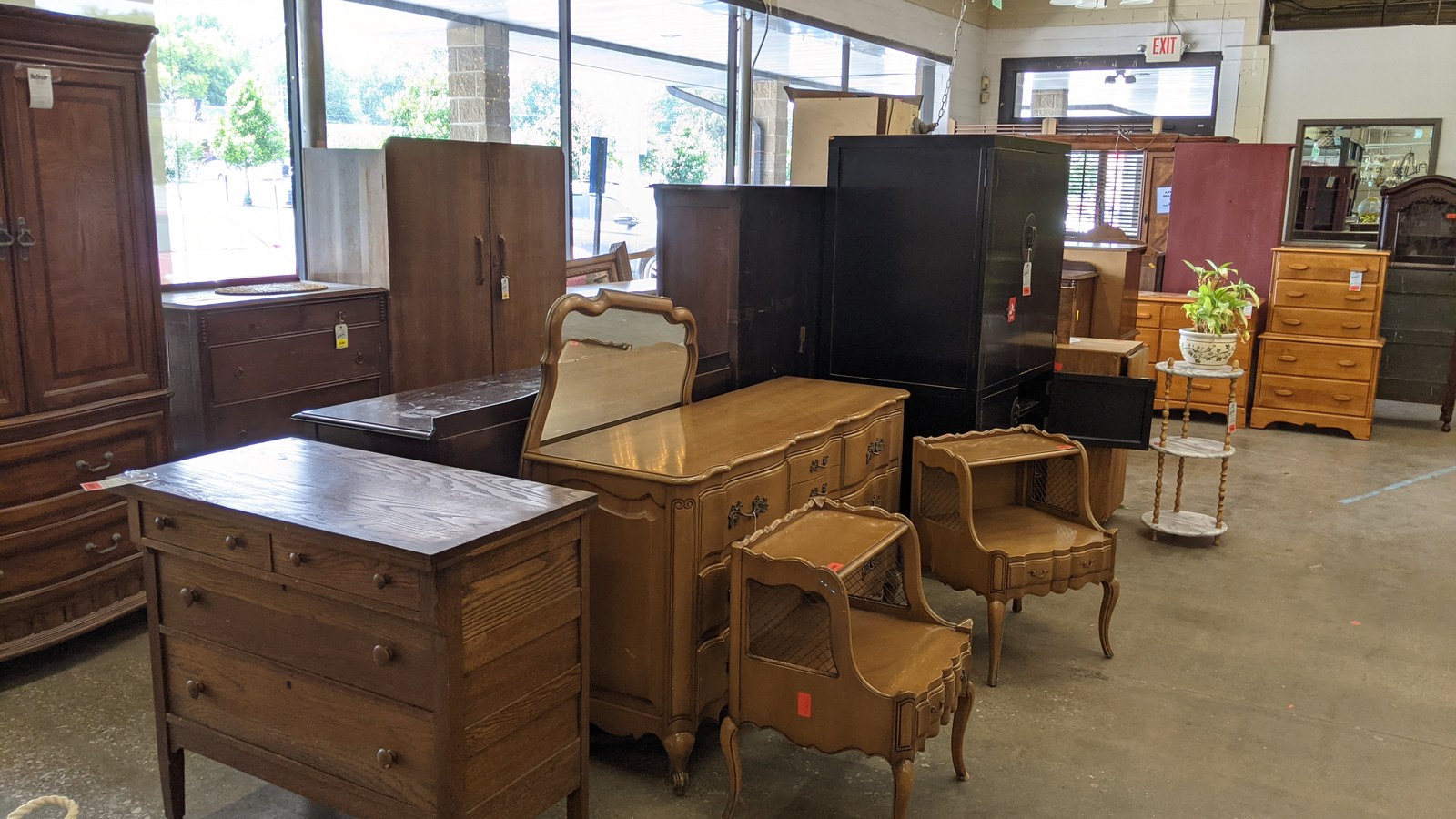 Wood tables, desks, chairs, and cabinets at Lexington Habitat for Humanity ReStore