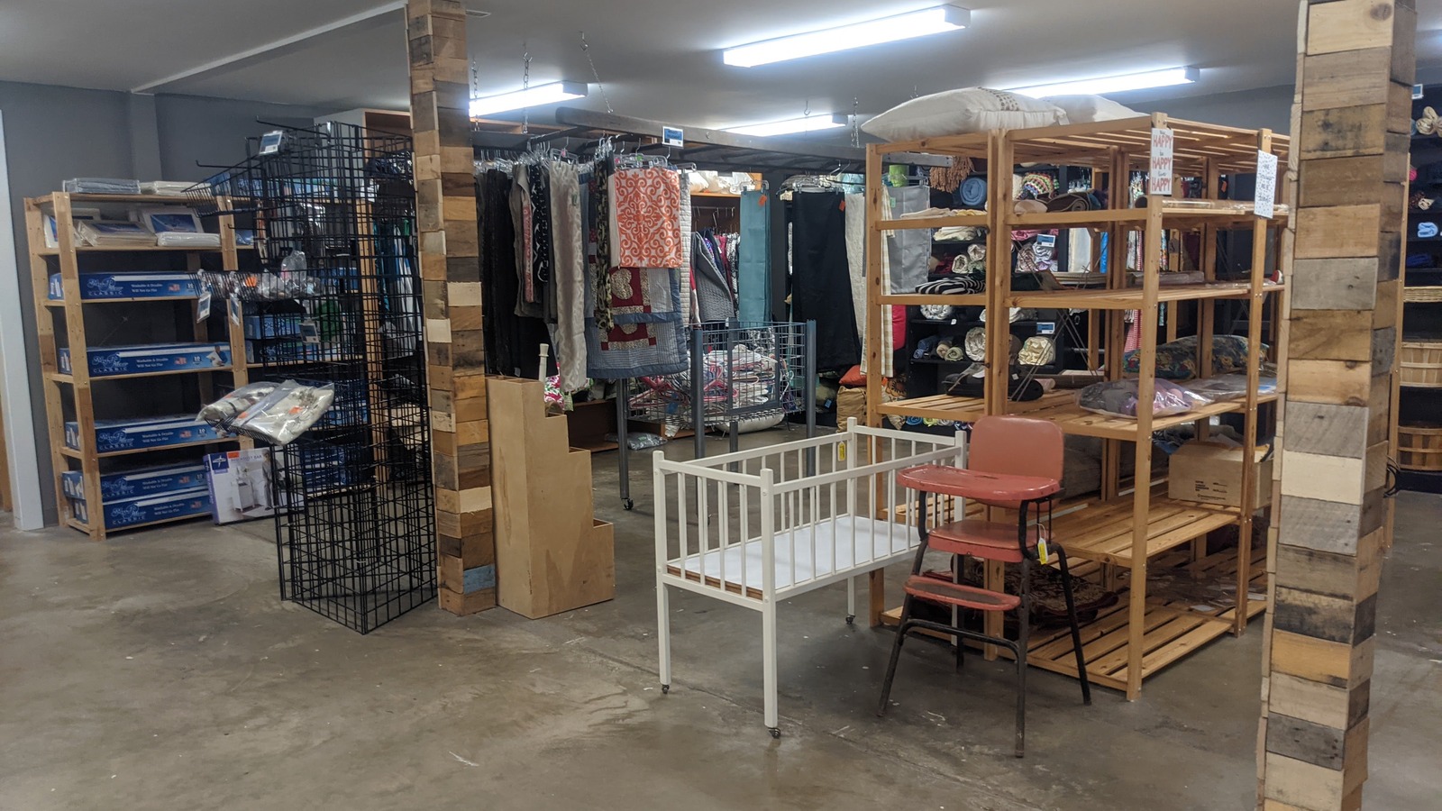 Decor, frames, and household finds inside The Well Thrift Store in Pella