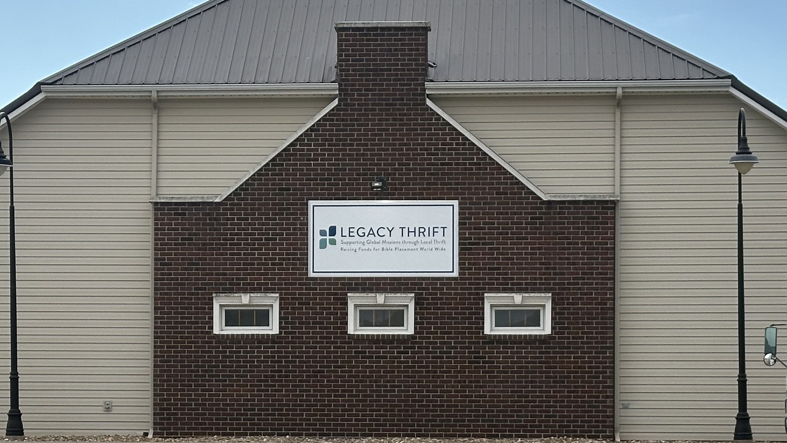 Brick storefront of Legacy Thrift in Pella