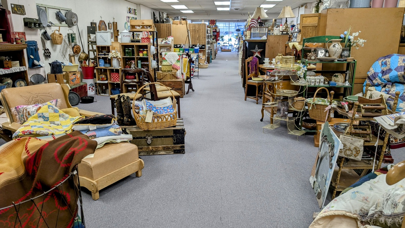 Furniture, baskets, decor, and vintage finds inside Ruby's Vintage in downtown Laramie