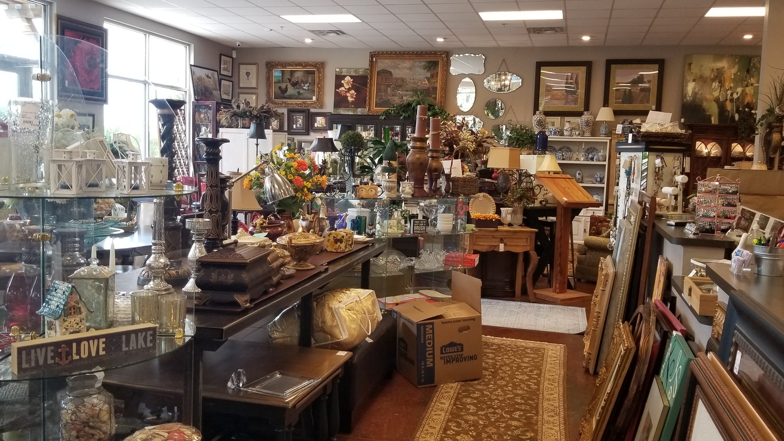 Furniture and home decor arranged at Encore Interior Consignment in Peachtree City