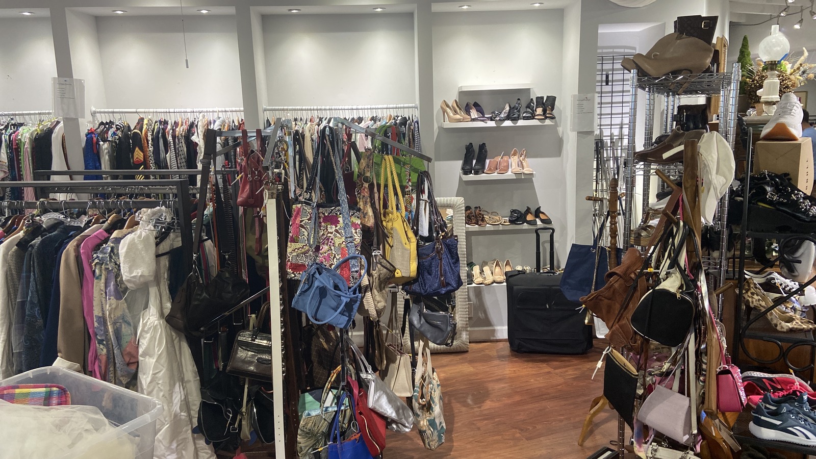 Clothing, shoes, and handbags inside Charity Thrift Stores in Delray Beach