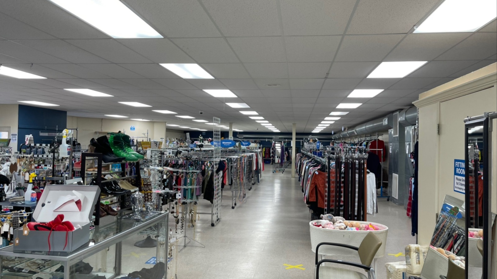 Long secondhand aisles inside the Goodwill store on Washington Avenue