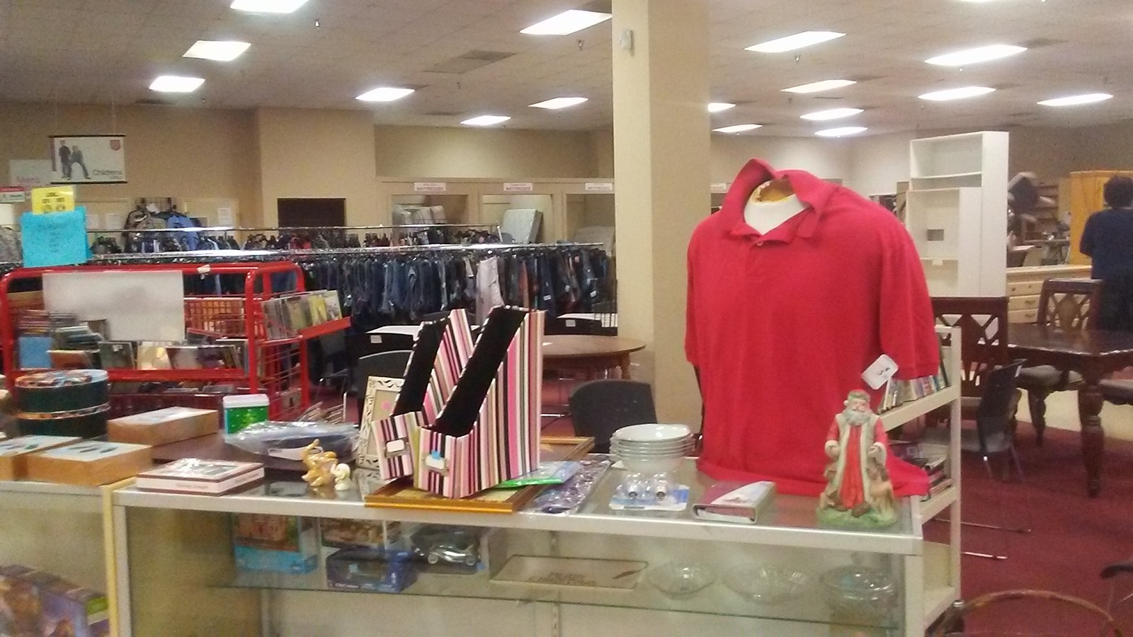 Clothing racks, furniture, and display cases at the Salvation Army Family Store near Garner