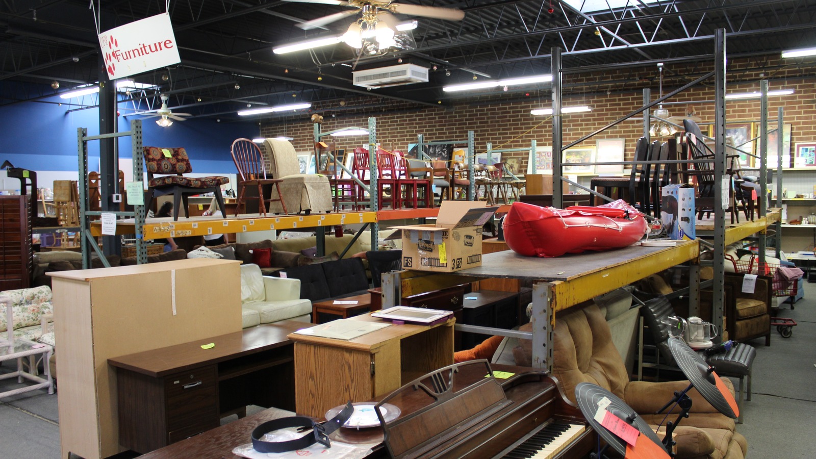 Furniture and home goods across the Cause for Paws Thrift Shop sales floor