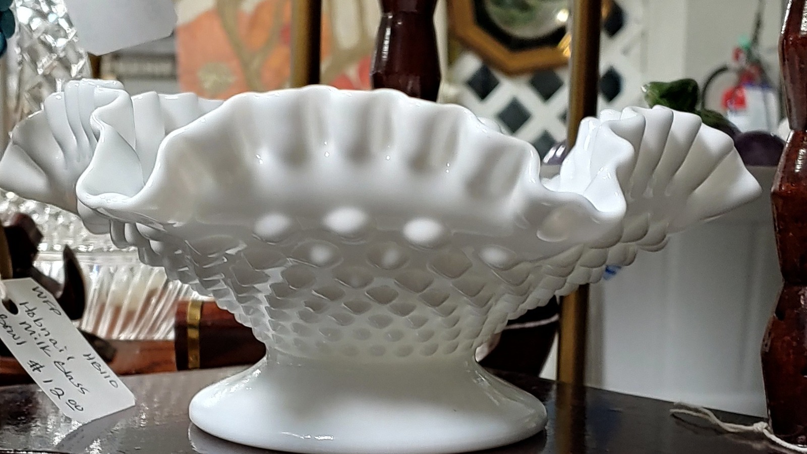 Vintage milk-glass centerpiece among the finds at Collected Treasures in Garner