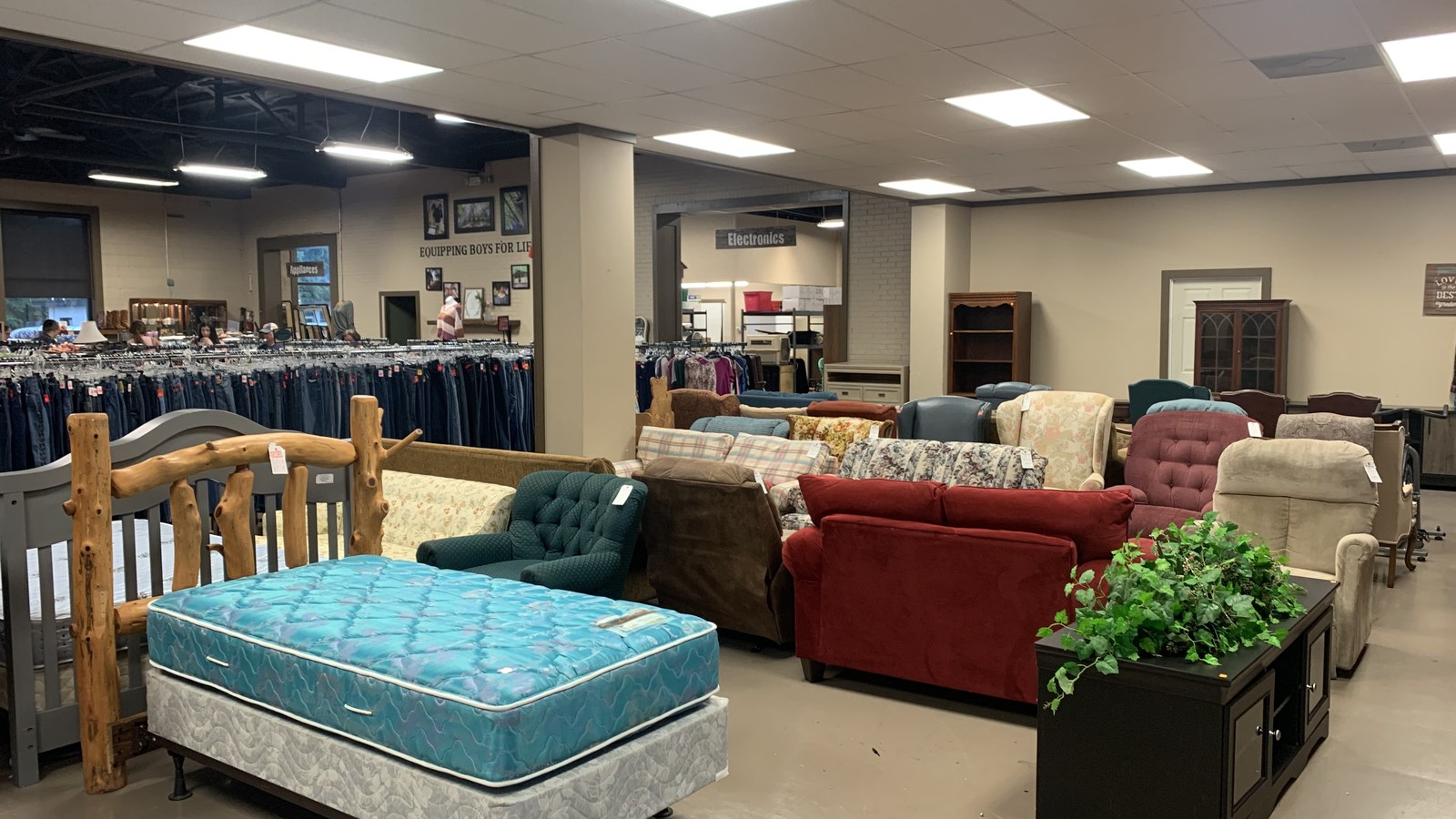 Furniture and mattresses at Boys Camp Thrift Store in Seneca