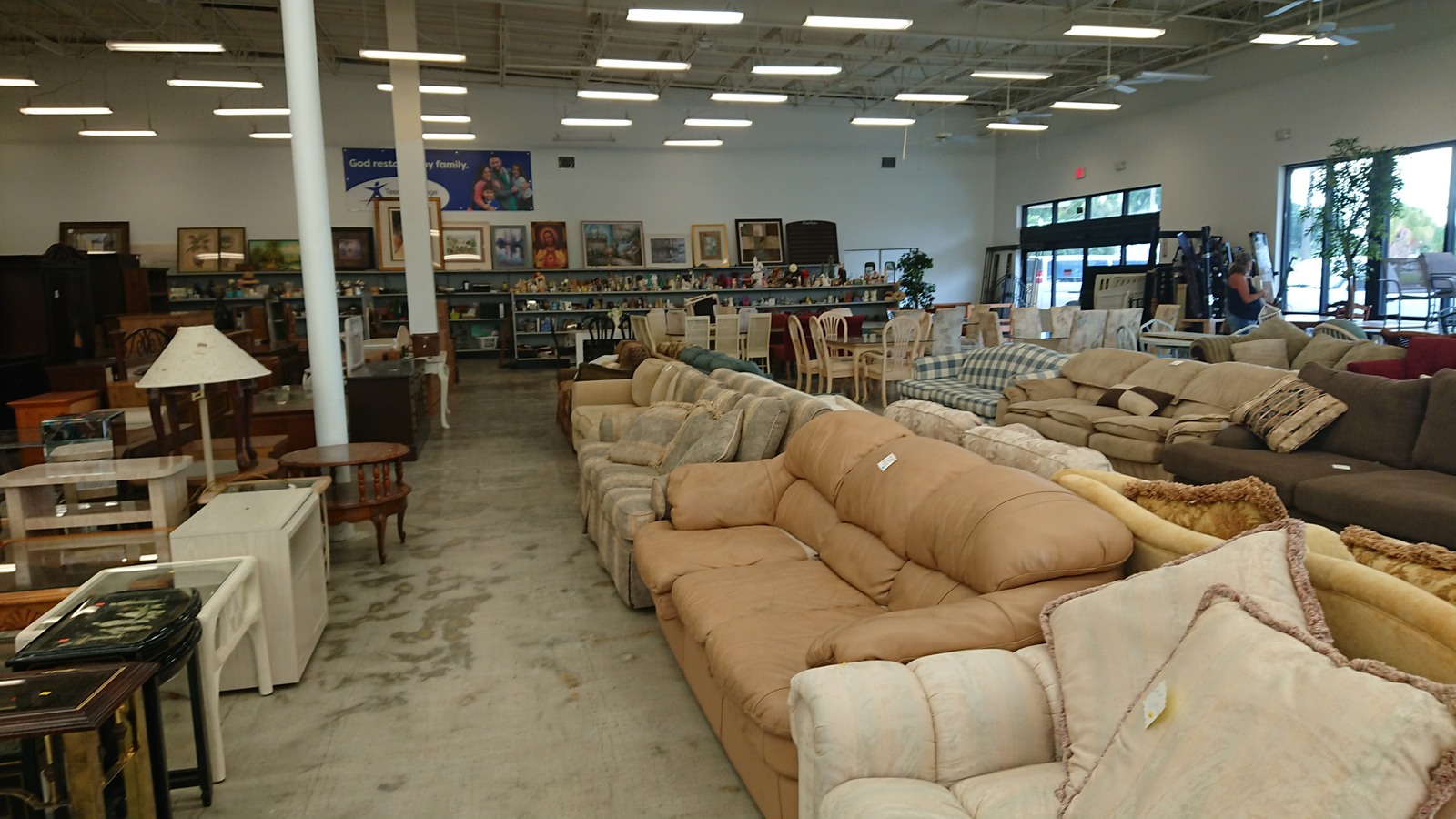 Sofa rows inside SuperThrift Fort Myers on South Tamiami Trail