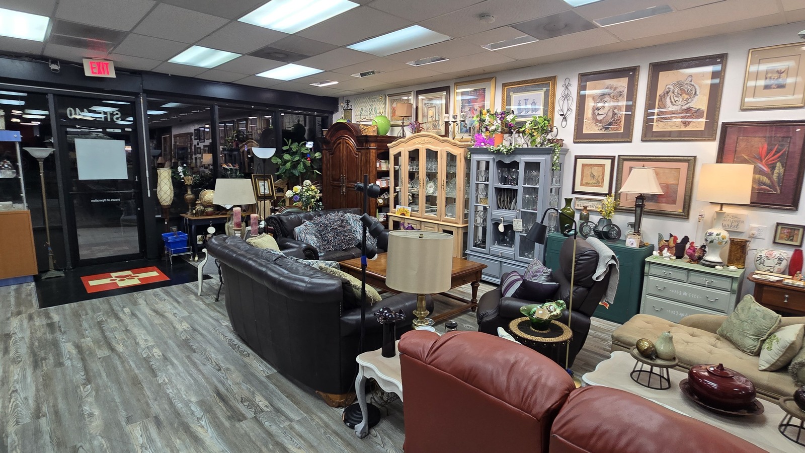 Vintage-style furniture and decor inside Paws Crossed Thrift Shop