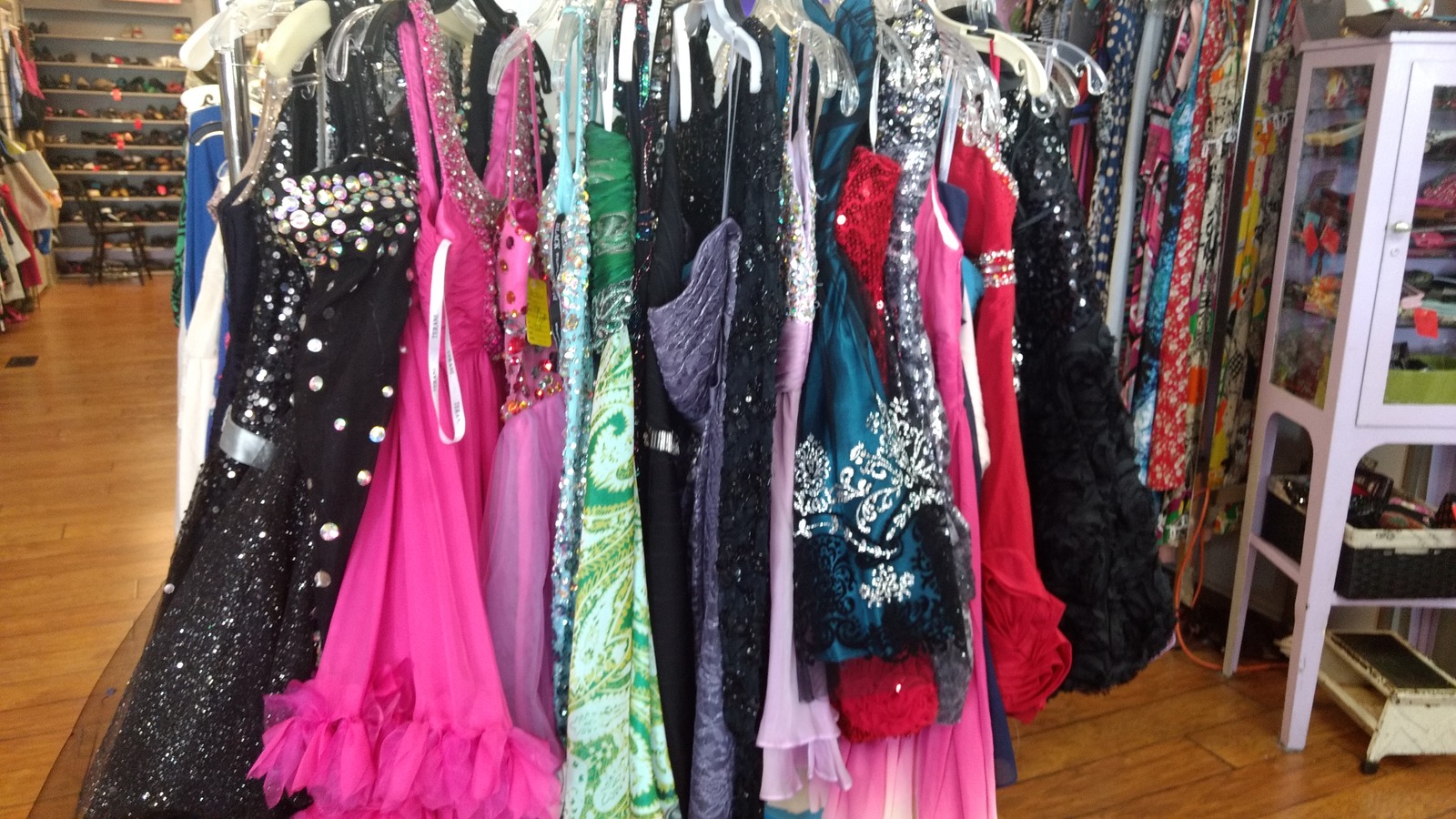 Formal dresses and occasion wear inside Second Hand Rose Clothing Store in Ashland