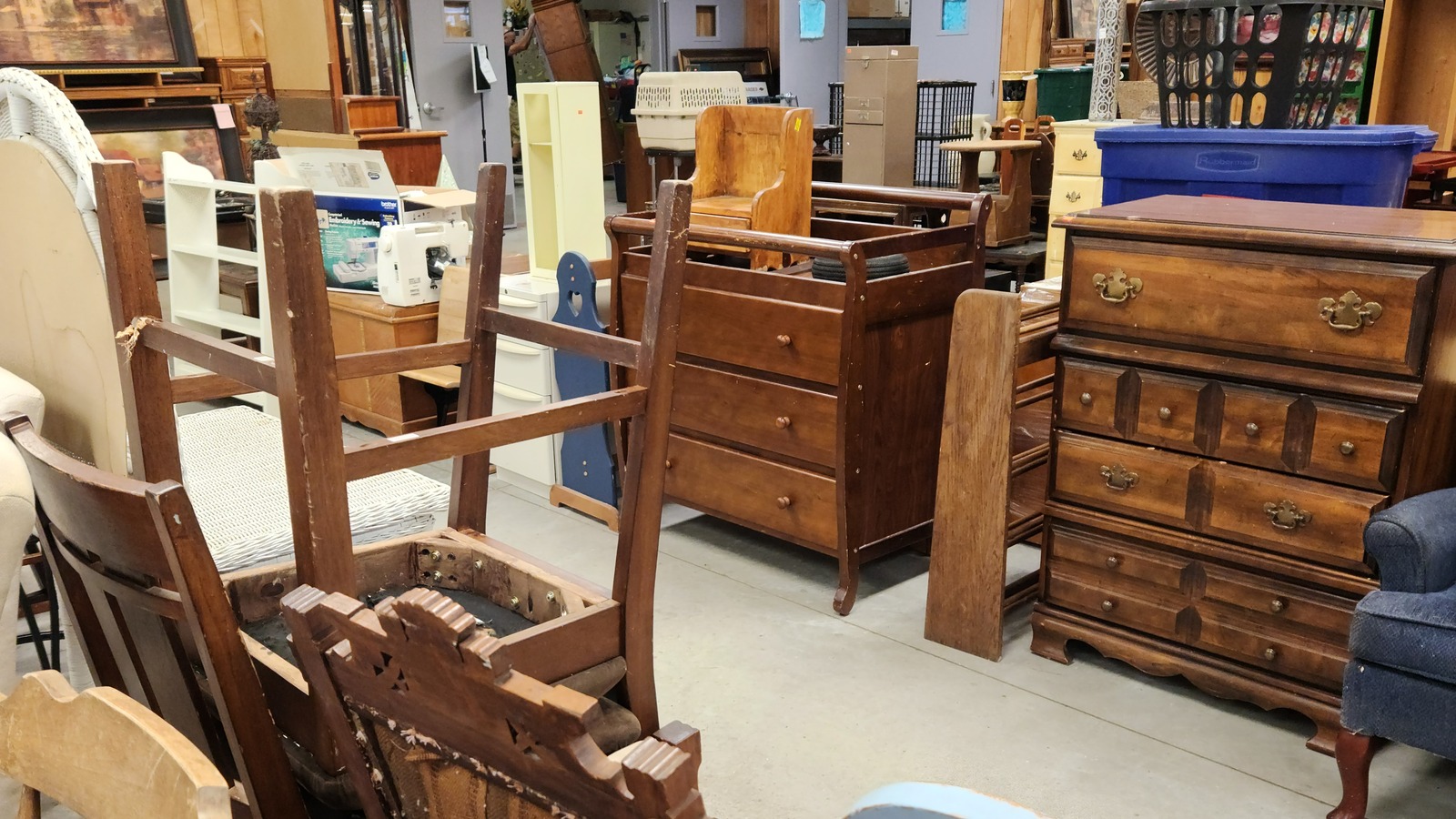 Wood furniture and display pieces inside Helping Hands Inc. Thrift Store in Bentonville