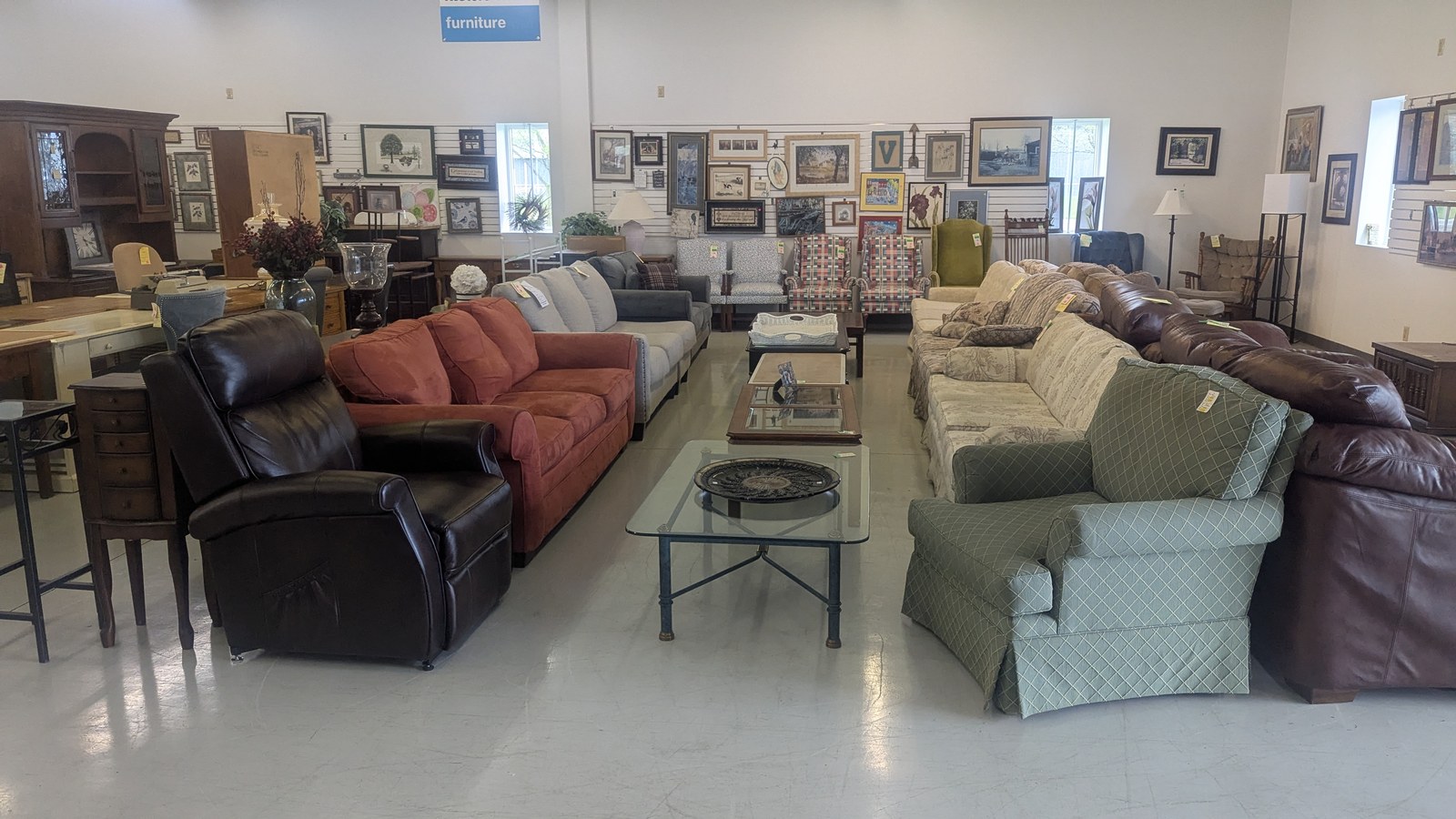 Sofas, chairs, and accent furniture inside Habitat for Humanity ReStore Bowling Green