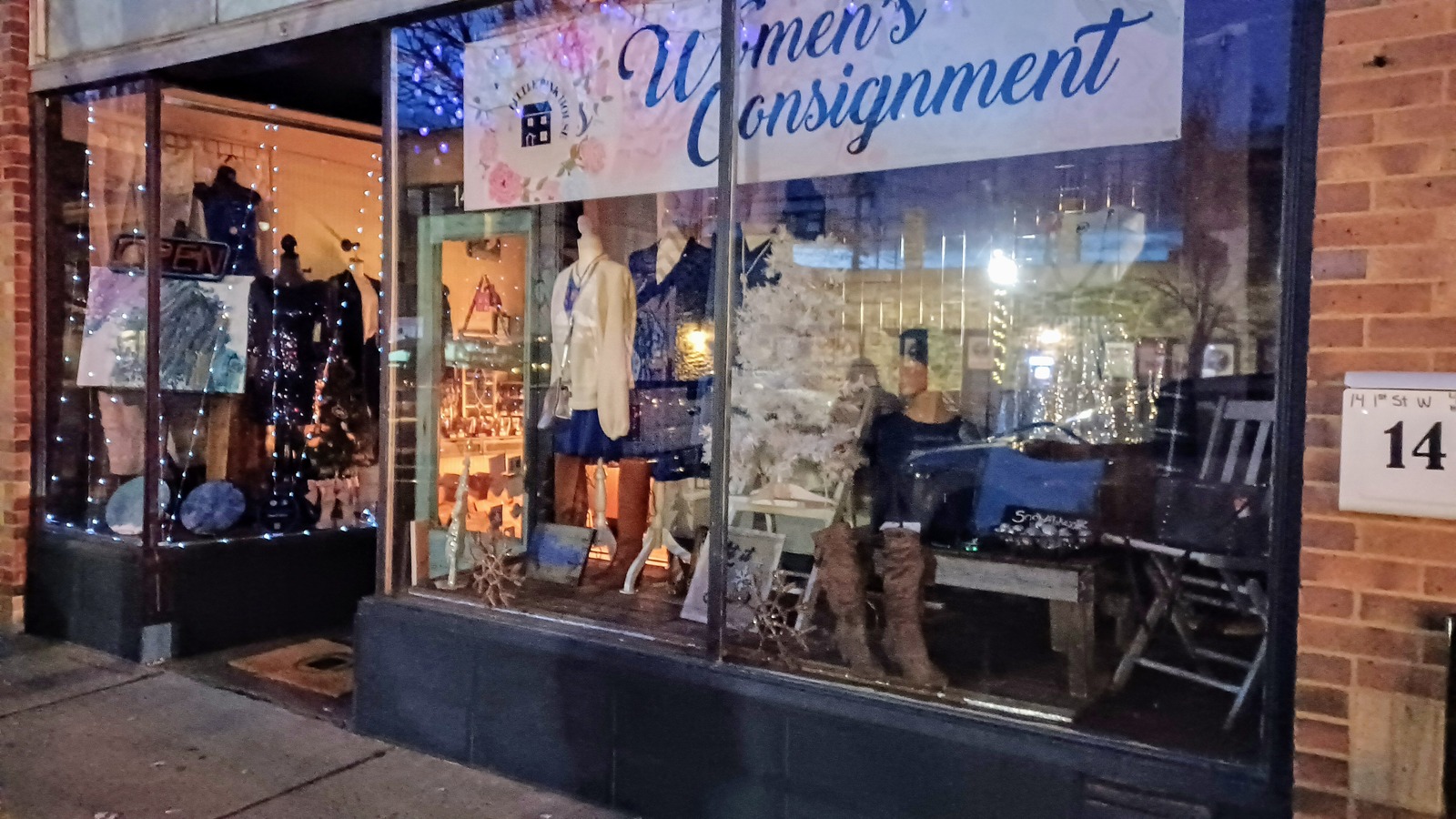 Downtown window display at Little Pink House of Consignment in Dickinson