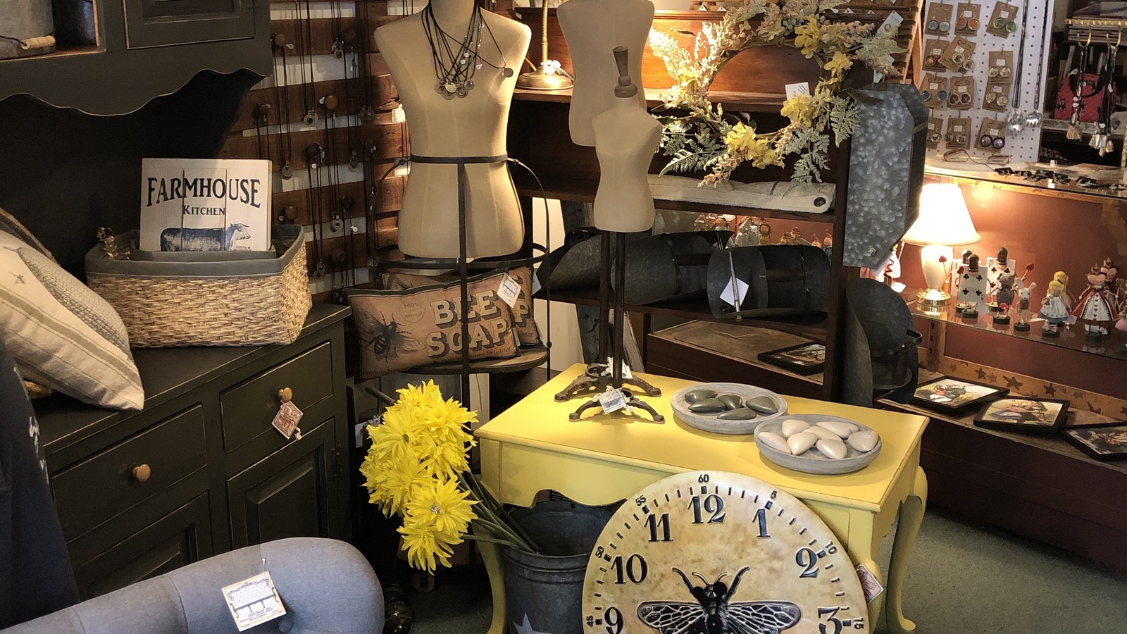 Vintage clocks, mannequins, furniture, and display pieces inside Just the Thing in Dover