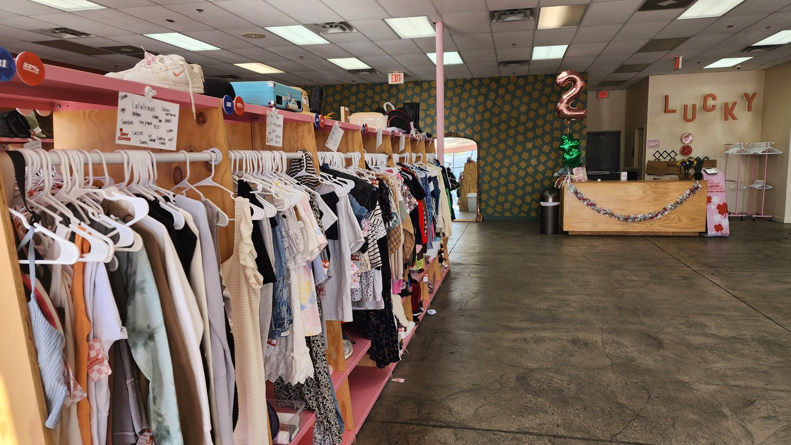 Booth-lined sales floor inside Indy Clover Gilbert