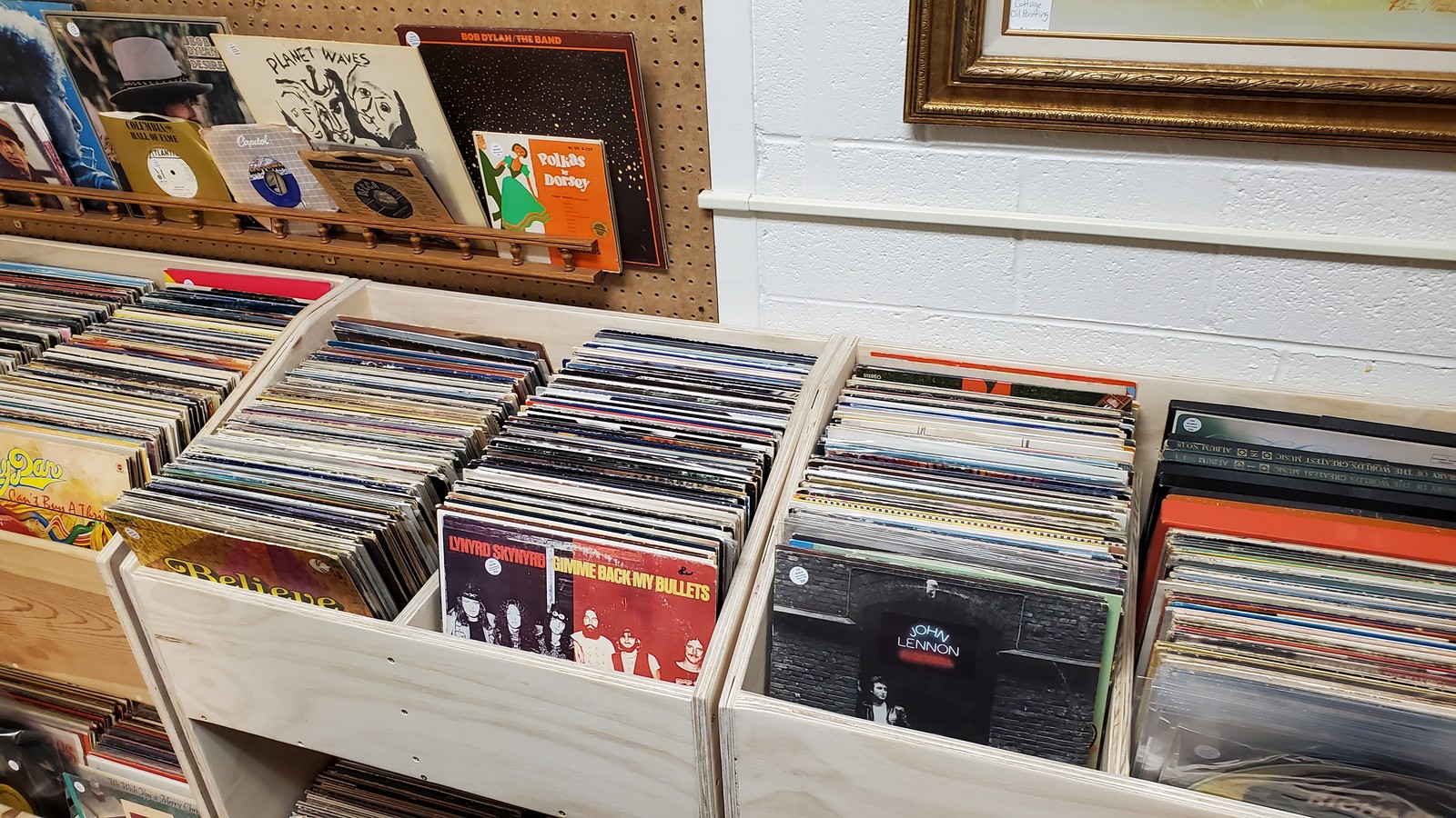Record bins and album displays inside Call it New/Call it Antique in Stevens Point