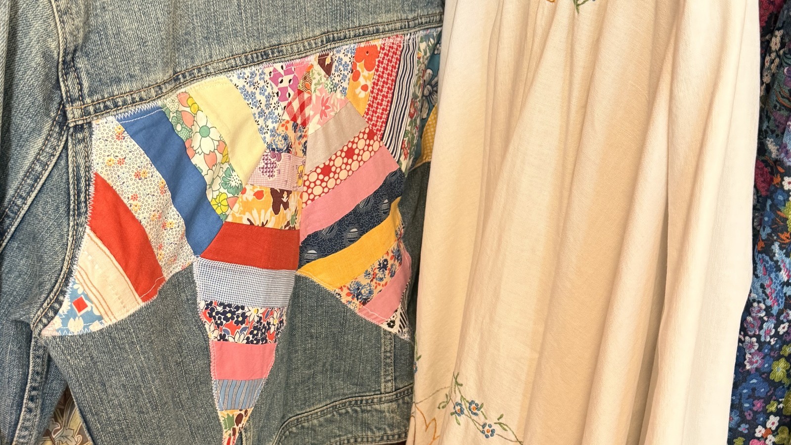 Patchwork denim jacket and vintage embroidered clothing at Drifters in Longmont Colorado
