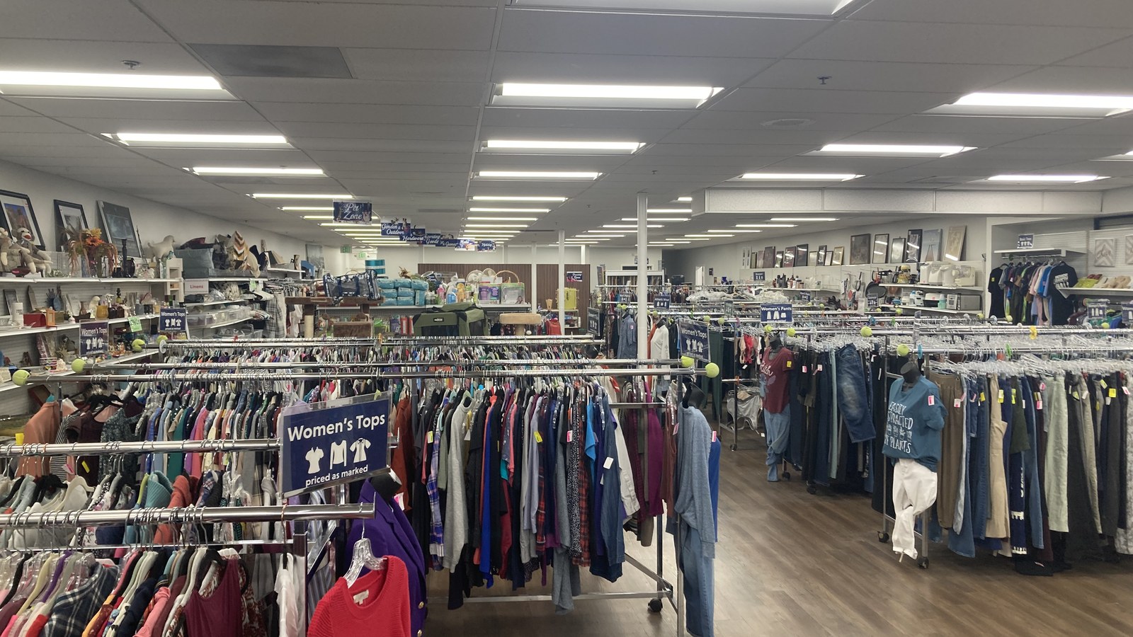 Clothing racks and home goods at Heartland Humane Thrift Shop in Corvallis Oregon