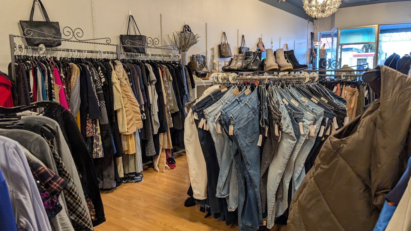 Curated clothing racks inside Second Glance in Corvallis Oregon