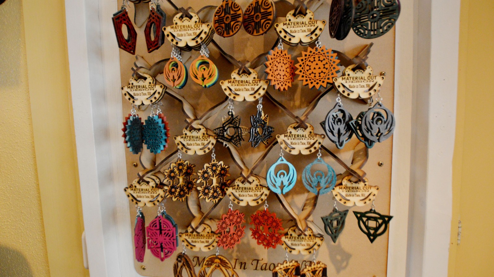 Handmade earrings displayed at Seconds in Taos New Mexico