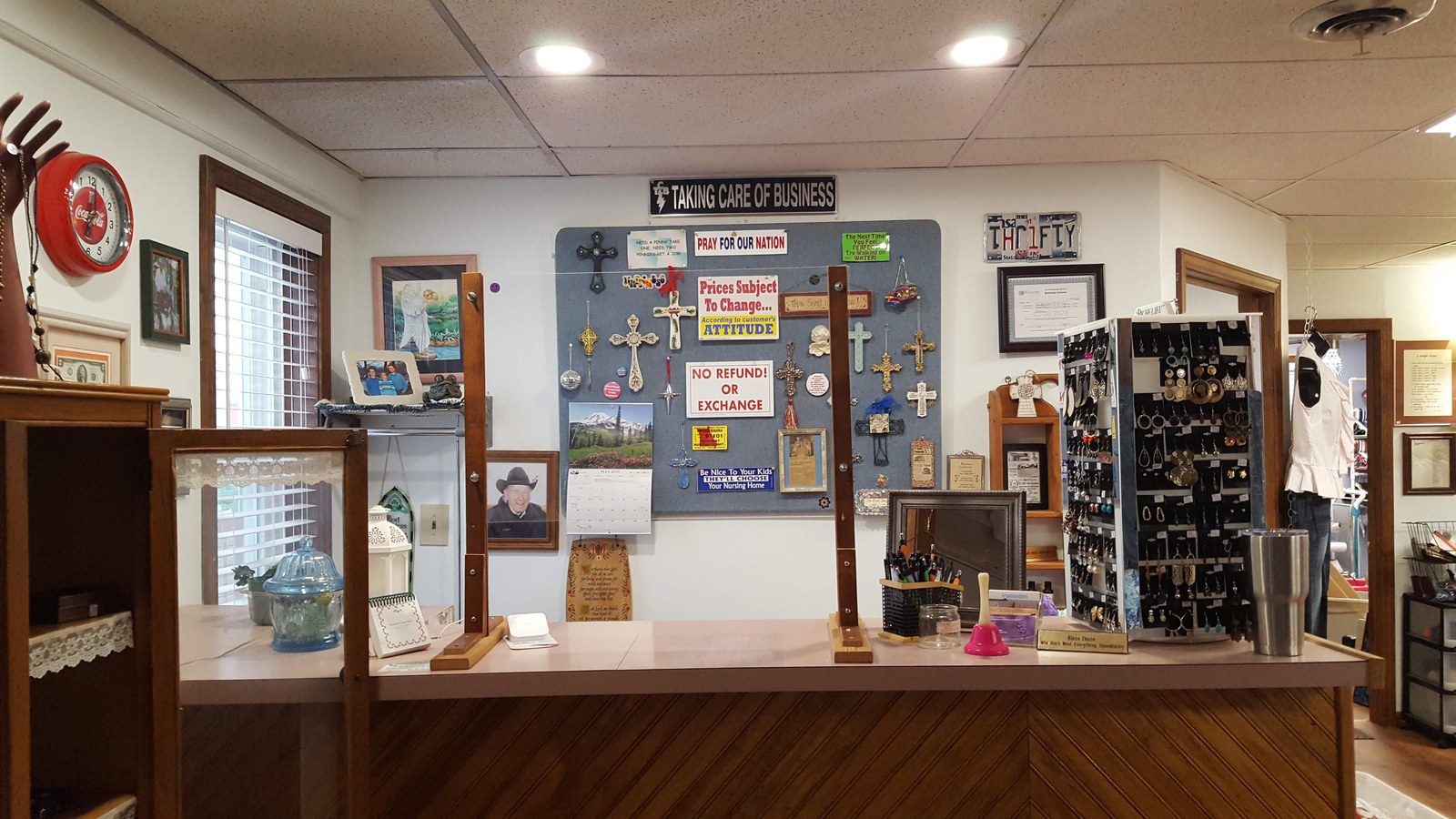 Front counter and jewelry display at Necessities Thrift Shop in Blue Springs Missouri