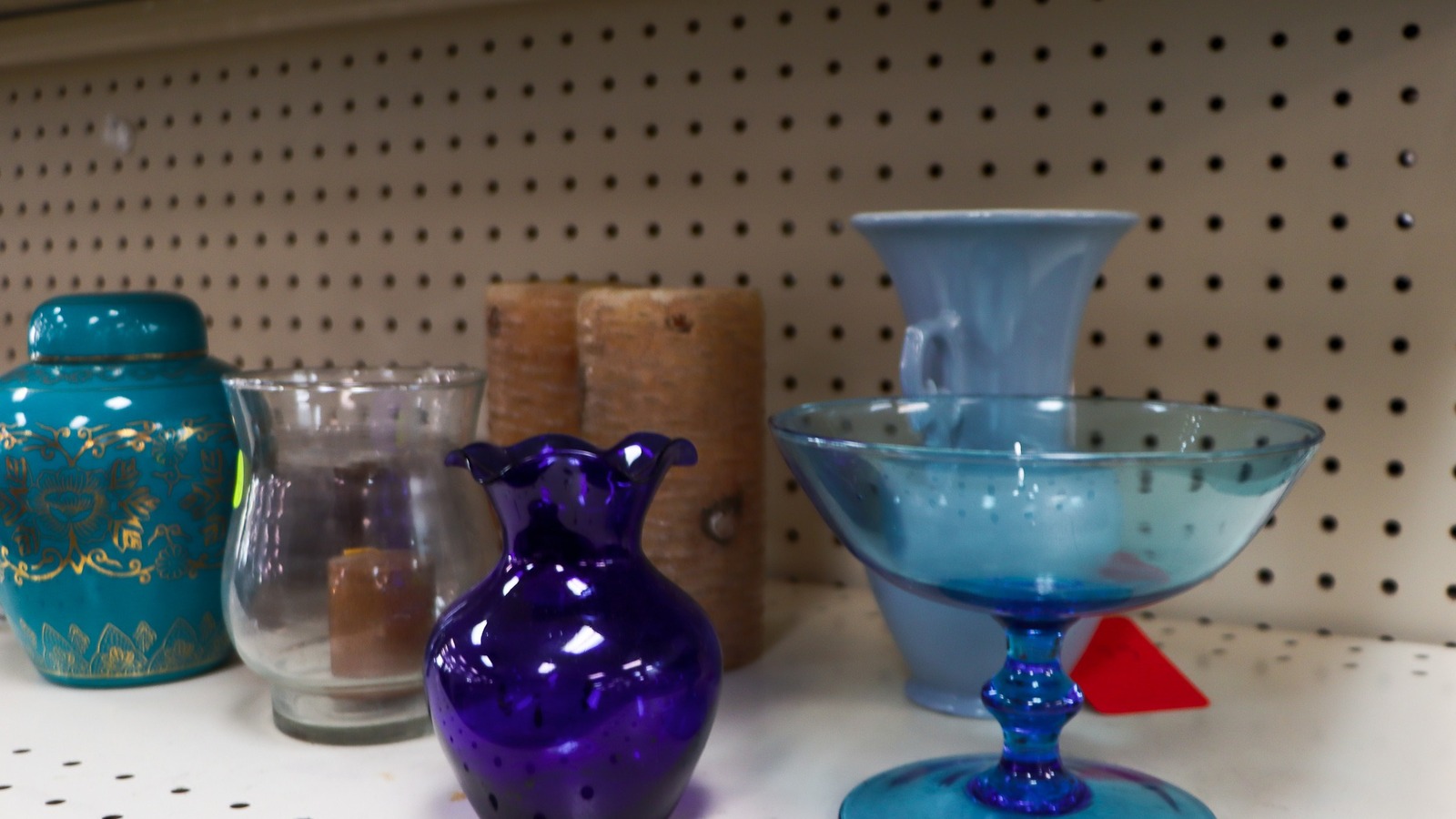 Housewares shelves inside Jericho Road Thrift Store on County Line Road in Spring Hill Florida