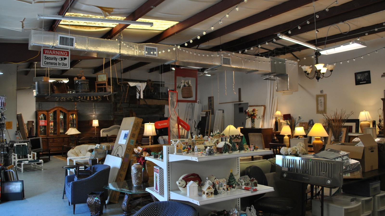 Furniture, lamps, and decor inside Thrifty Dog Thrift Store in Spring Hill Florida