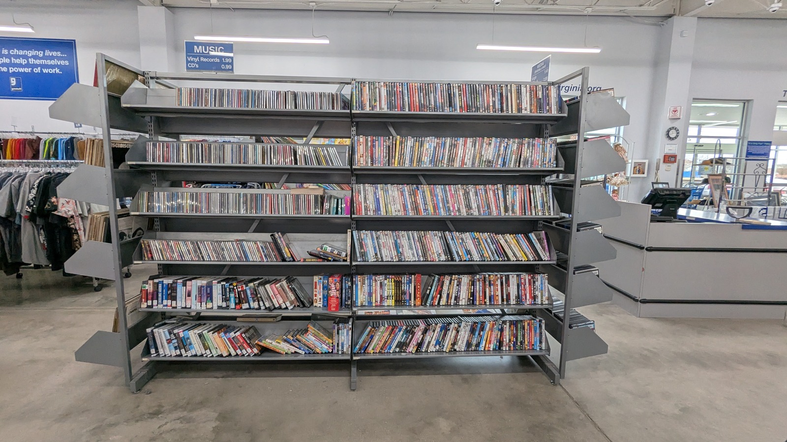 Long media shelves and bright sales floor inside Goodwill of Central and Coastal Virginia in Suffolk