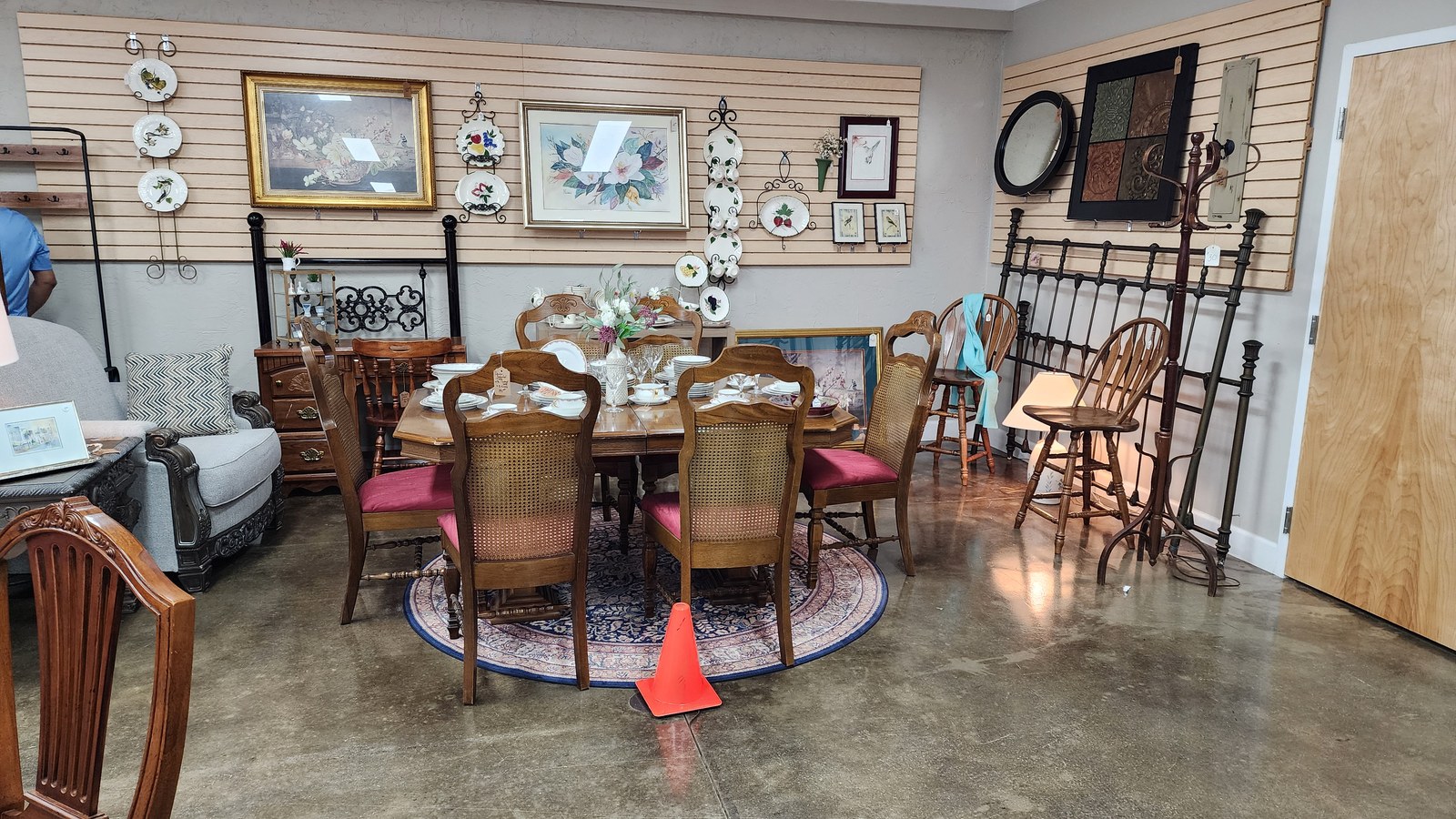 Furniture and housewares arranged inside St. Paul's Thrift Shop in Daphne Alabama